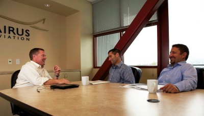 Rene Cervantes (right) meets with Tom Benvenuto (center), Solairus VP of Flight Operations and Dan Drohan (left), Solairus Chairman and CEO